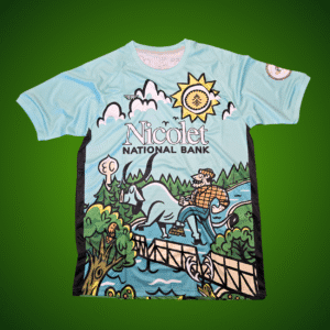 Union Des Bateaux FC home jersey light blue soccer kit with illustrated landscape graphic, sponsor logo, and club crest, custom performance uniform by Custom Athletics USA.